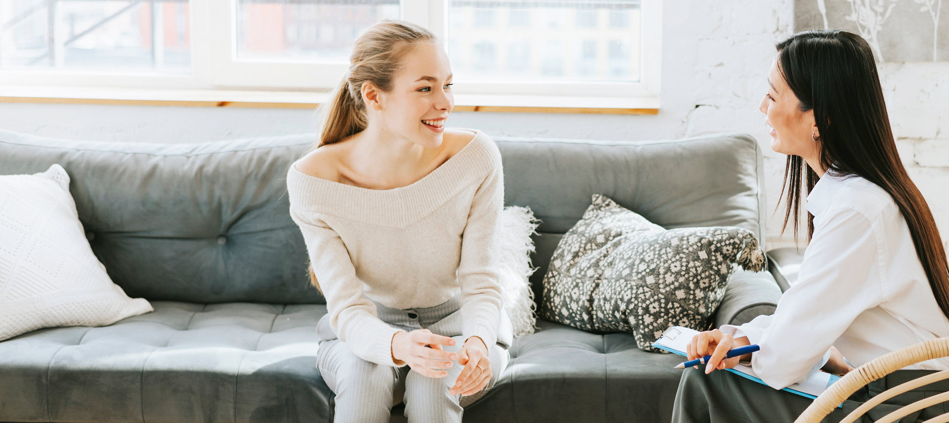 woman and her doctor talking insider her home